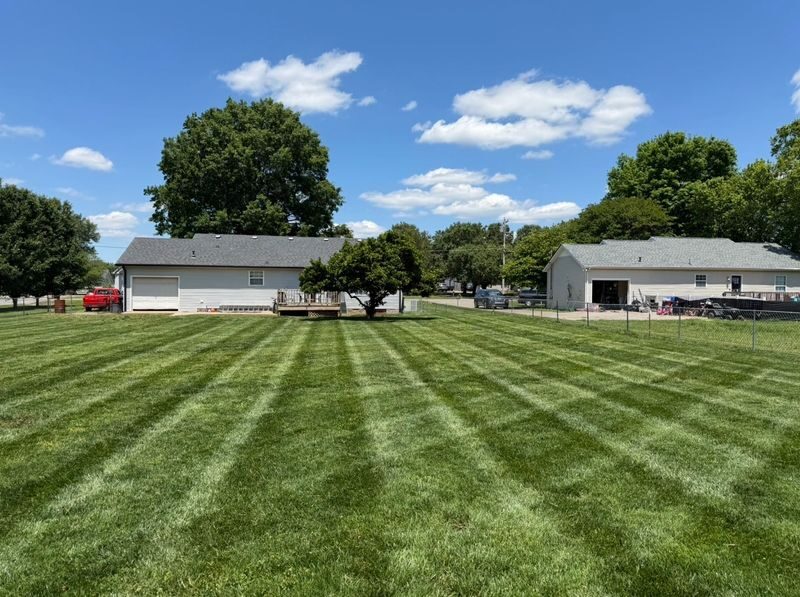 Top Notch crew maintaining a residential property